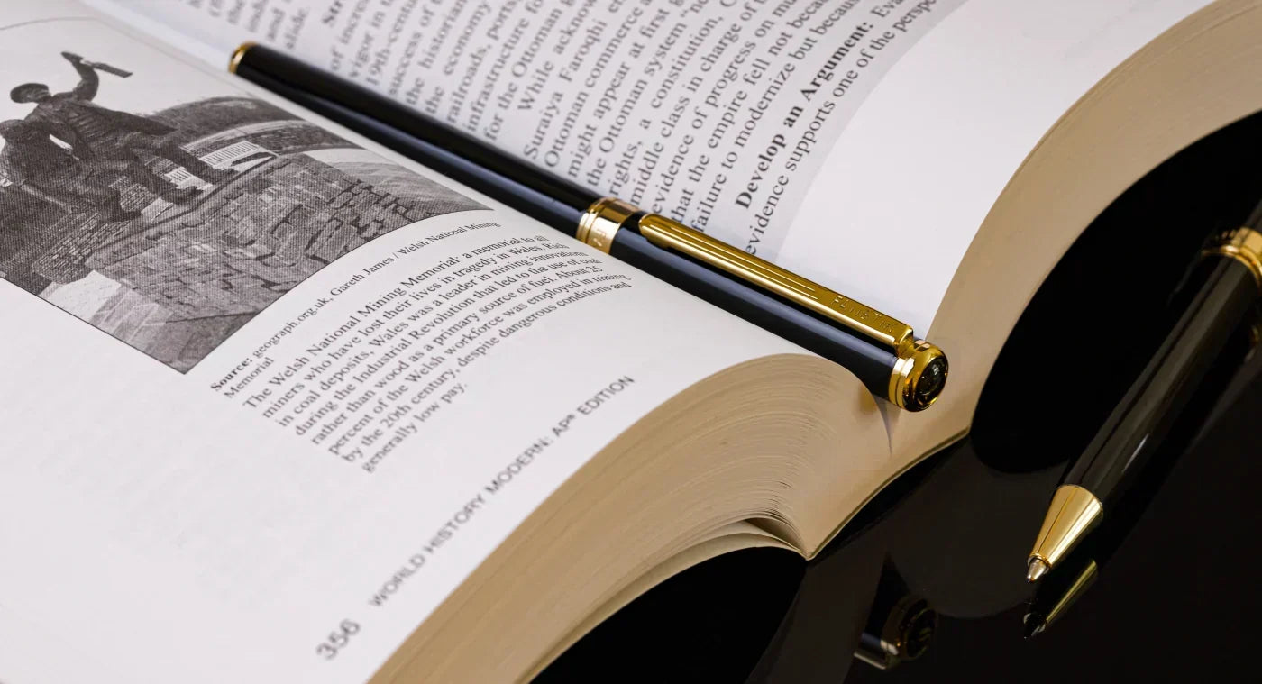 Fanstik Luxury Rollerball Pen on an open book