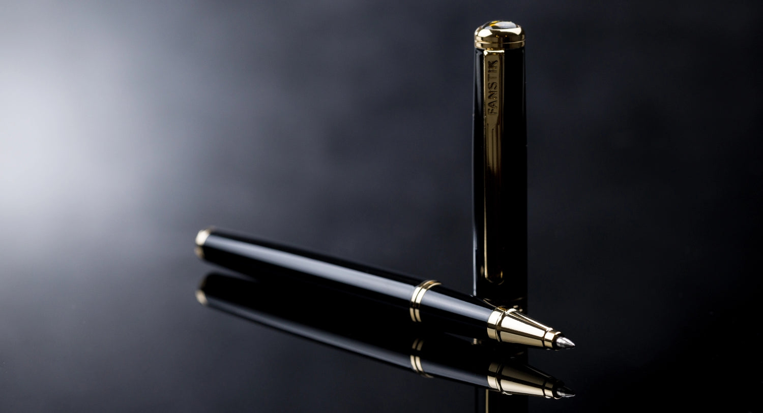 A Fanstik luxury Rollerball pen displayed on a dark surface